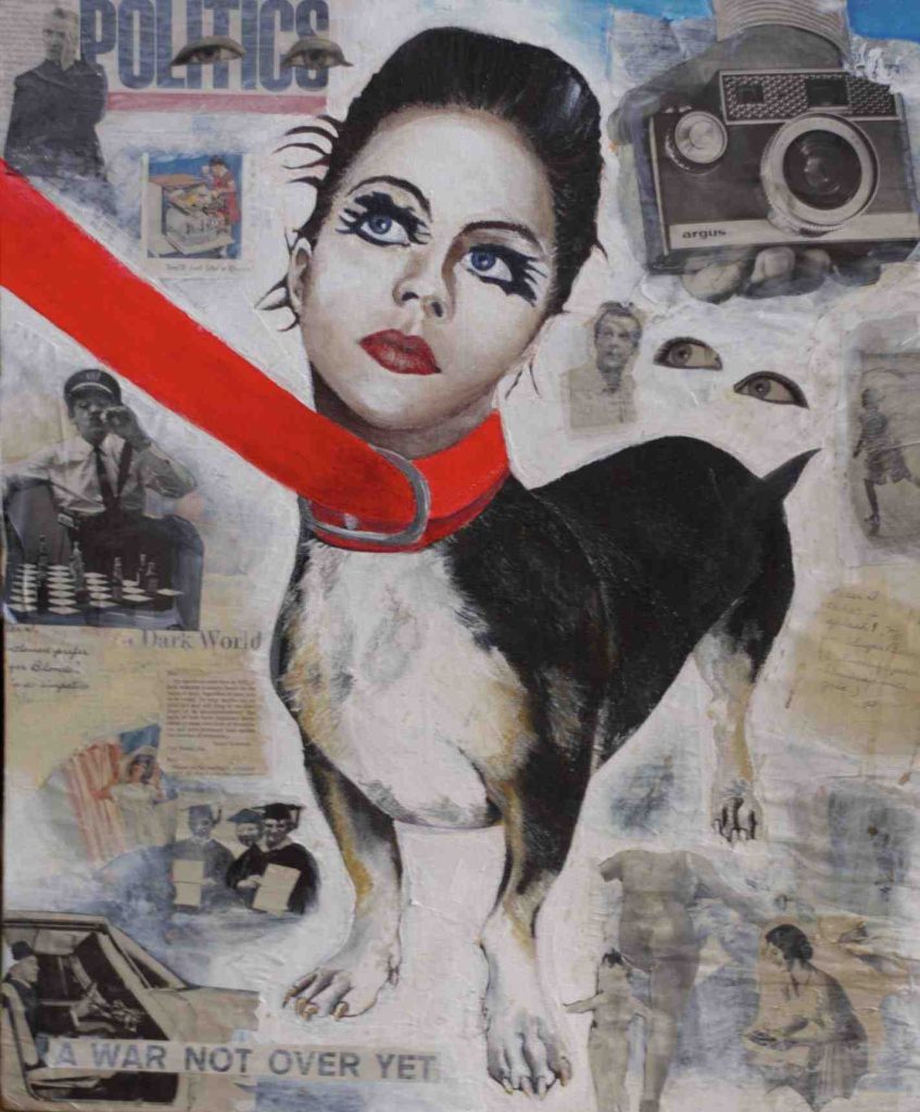 A War Not Over Yet. A small Jack Russell dog has the head of a woman. Her lead is made from an orange belt which is being held outside the picture so you can not see a hand holding it. The woman has dark eyeliner and red lipstick. The background is a collage of images of women graduating, a policaman playing chess and words such as "Politics" and "a war not over yet"